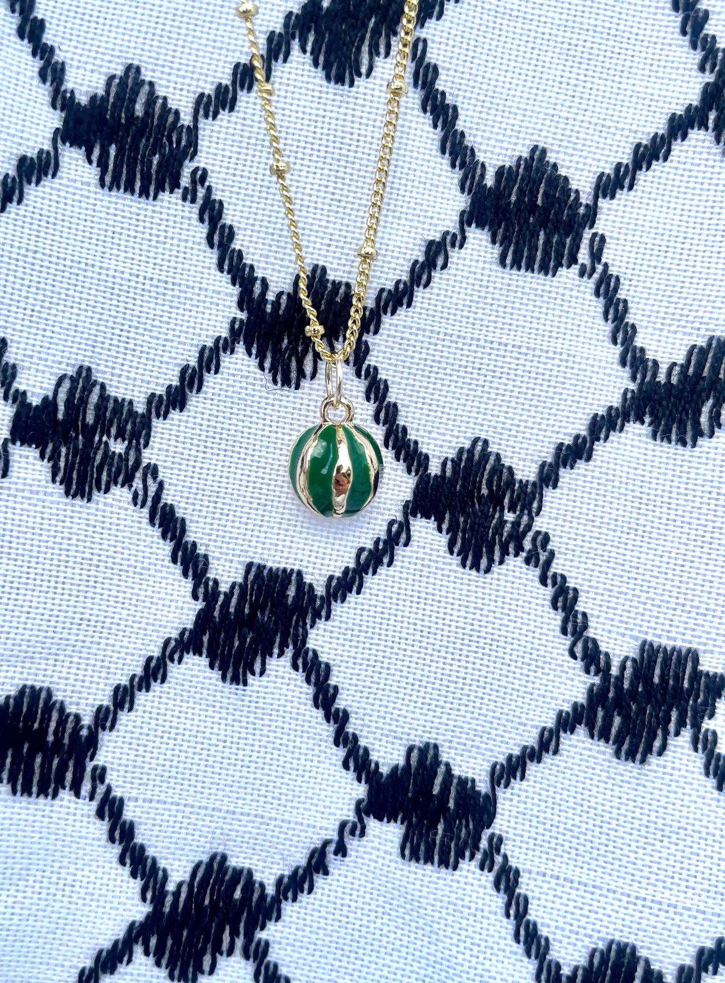 Watermelon pendant - gold plated brass sounds- in aid of a Palestinian mother.