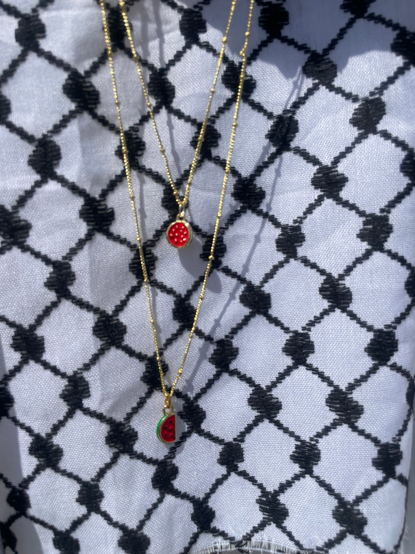 Watermelon pendant - gold plated brass sounds- in aid of a Palestinian mother.