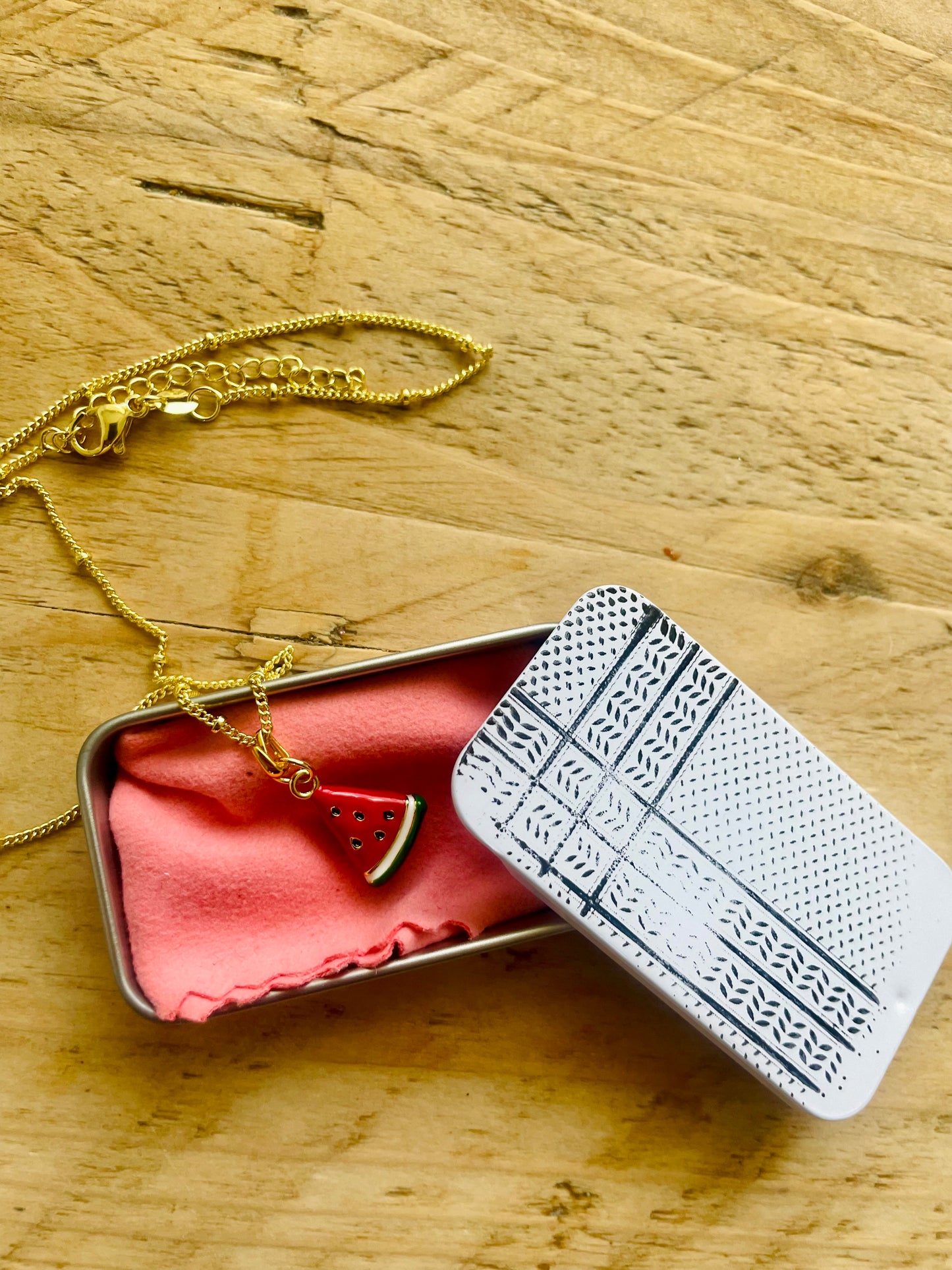 Watermelon pendant - gold plated brass sounds- in aid of a Palestinian mother.