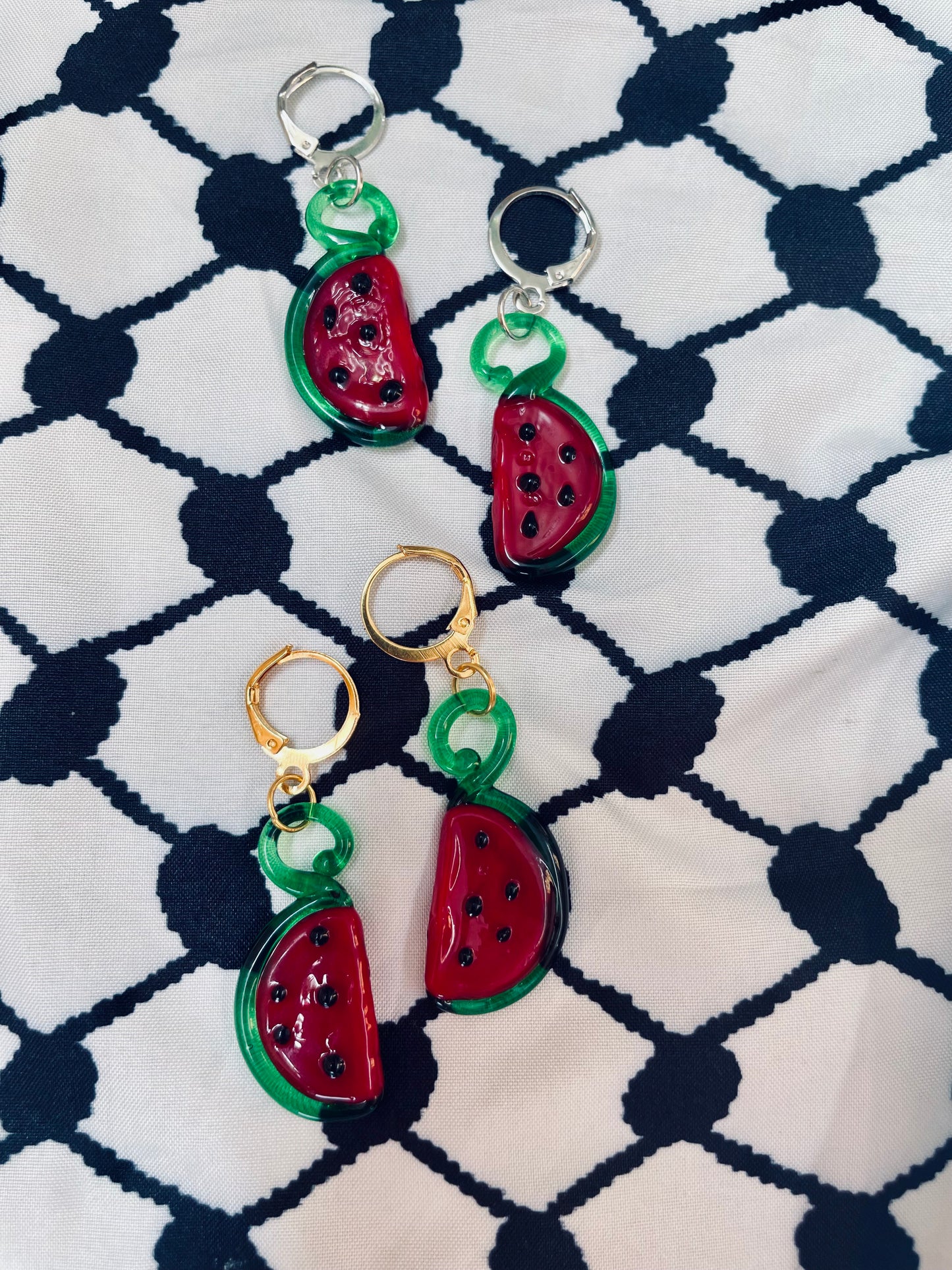Glass watermelon earrings in aid of a mother in Palestine