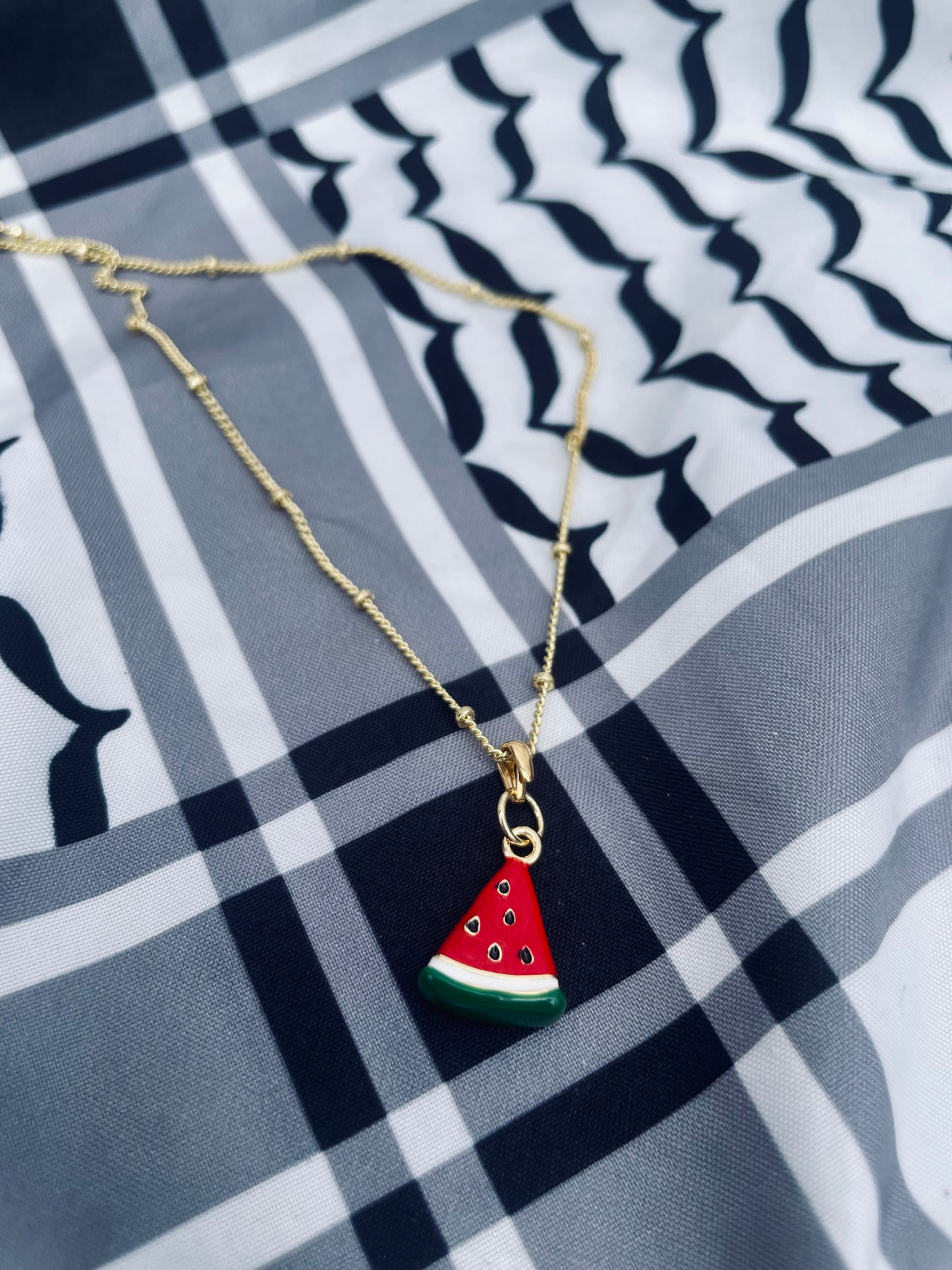 Watermelon pendant - gold plated brass sounds- in aid of a Palestinian mother.