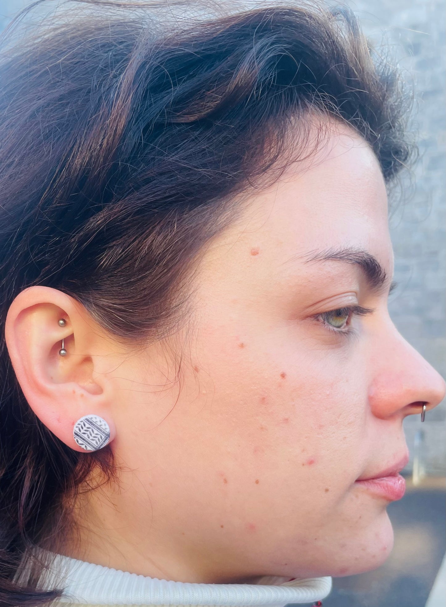 Keffiyeh earrings in aid of a Palestinian mother.