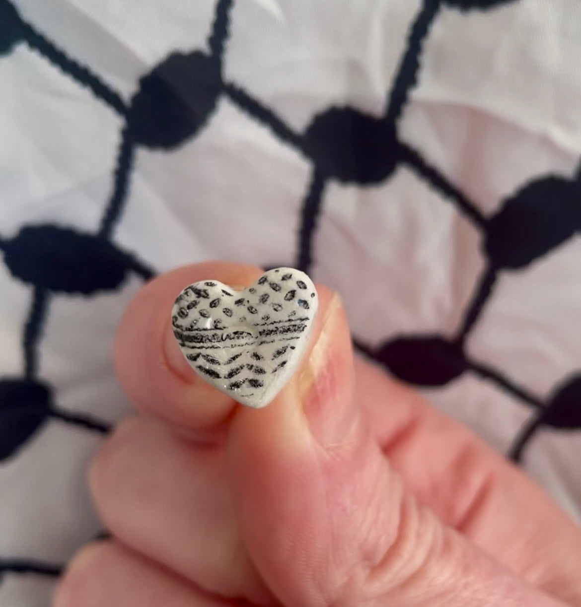 Keffiyeh earrings in aid of a Palestinian mother