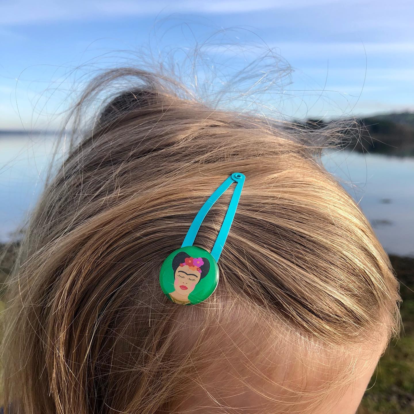 Photo of girl wearing hair clip featuring Frida